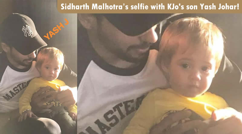 Sidharth Malhotra’s cute pose with Karan Johar's son Yash Johar!